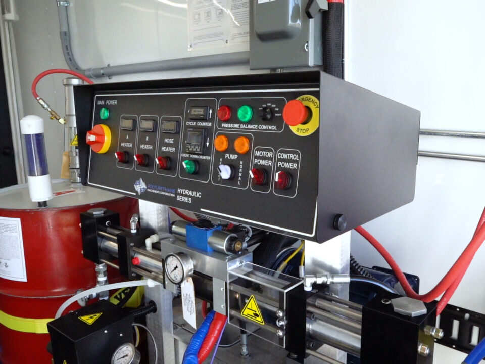 Proportioner control panel inside an ArmorThane spray rig
